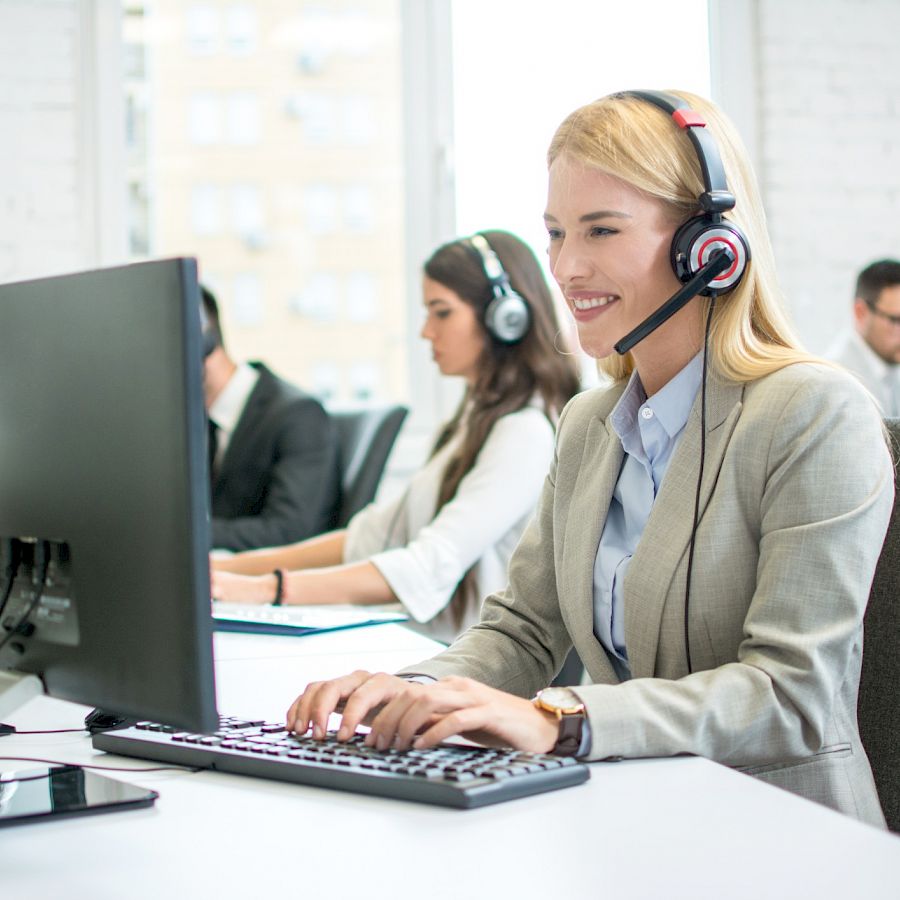 female Call centre agent, smiling