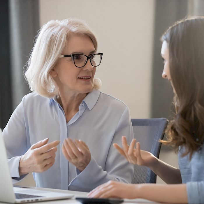 two female executives talking