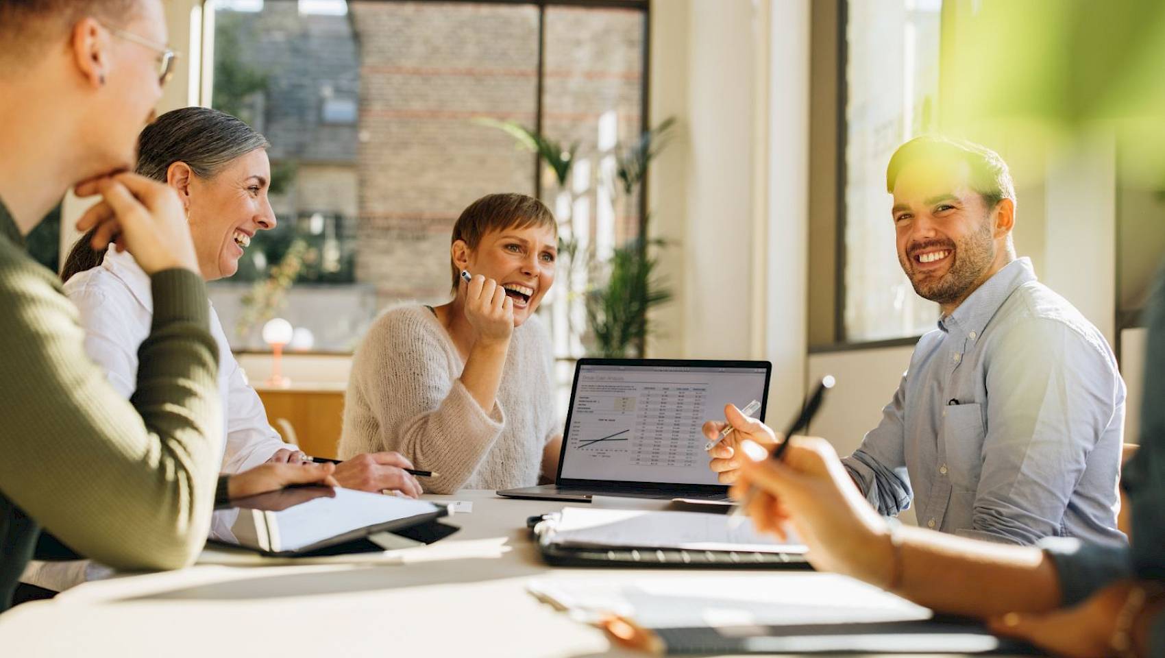 professional team around meeting table