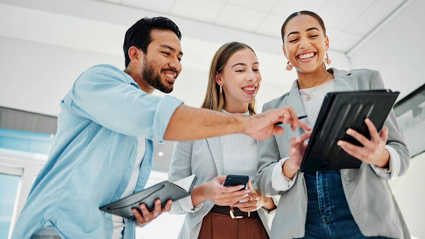 Confident woman leading a discussion with colleagues