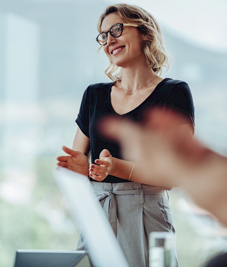 Happy woman having a work discussion