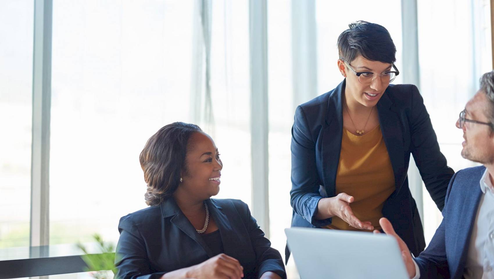 professional team in a meeting talking