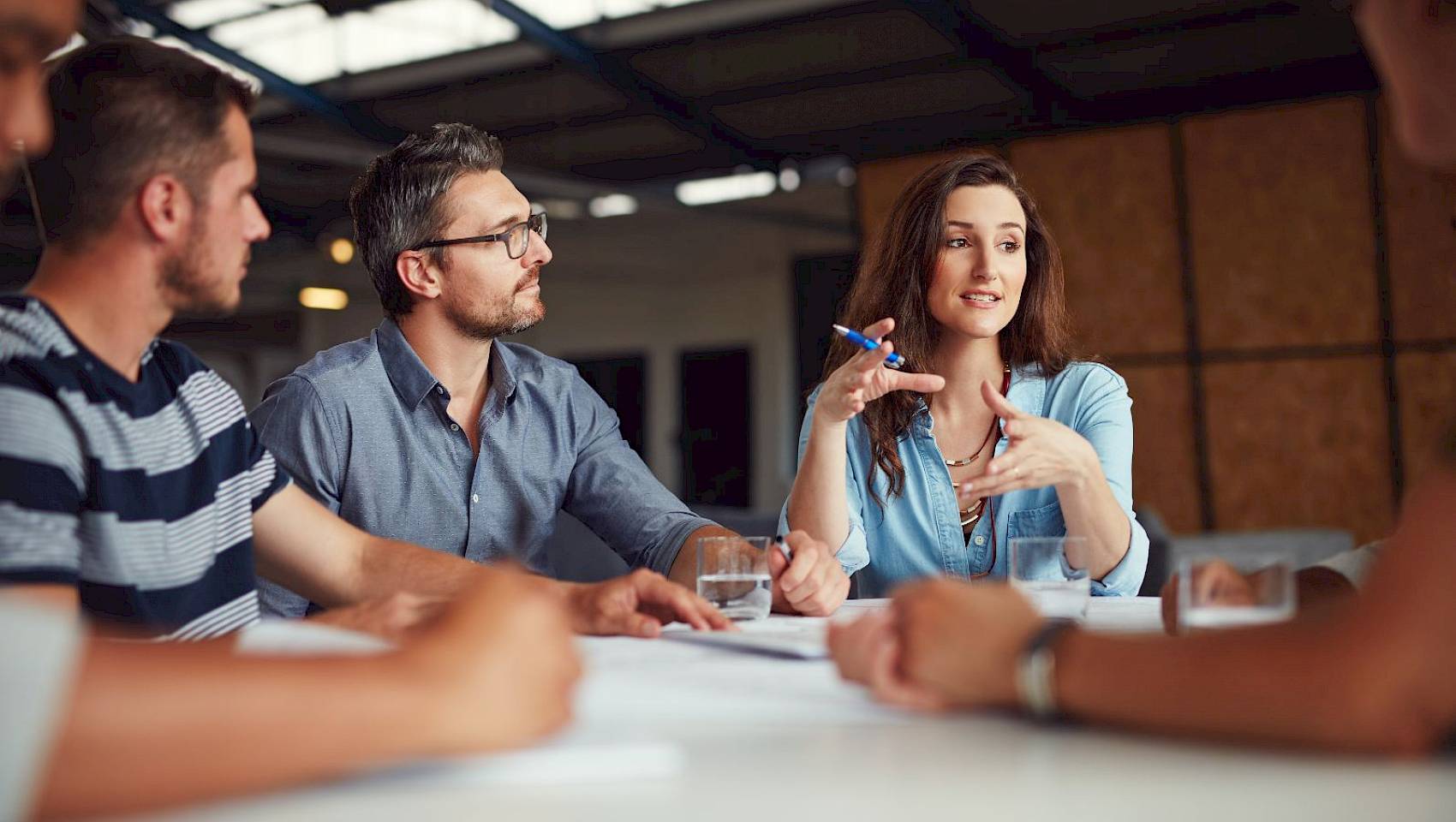 professional team around meeting table