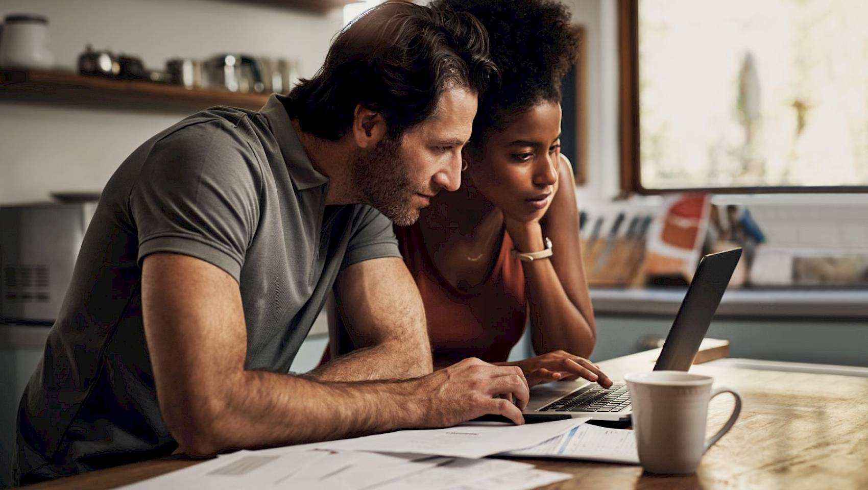 Couple looking at laptop