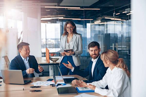 professional team in a meeting talking