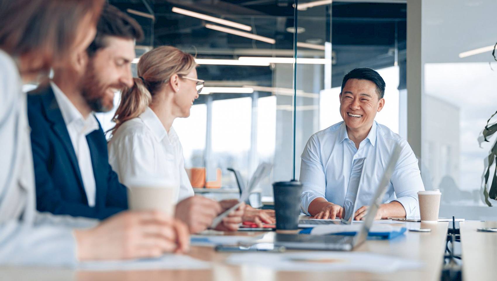 professional team in a meeting talking