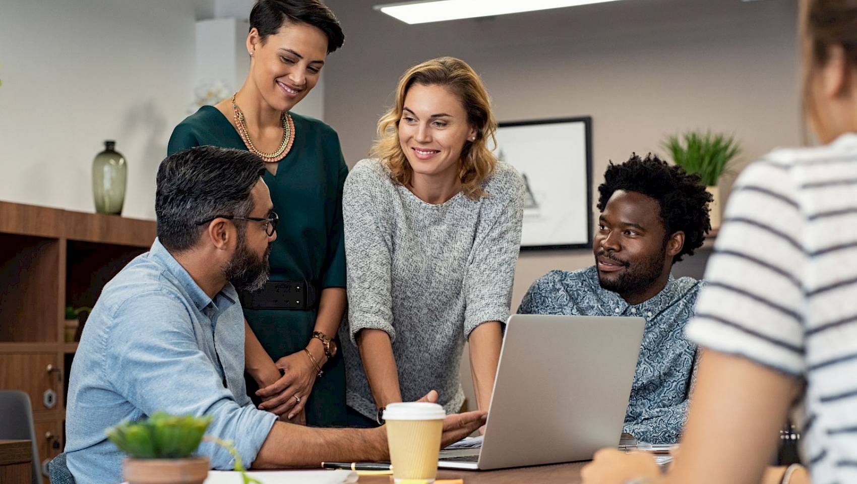 professional team in a meeting talking