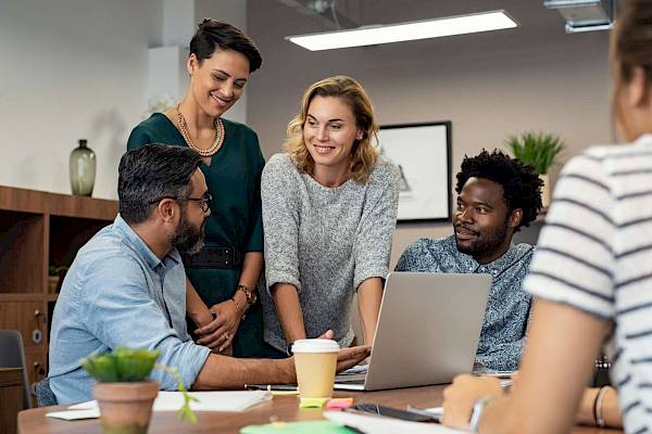 professional team in a meeting talking