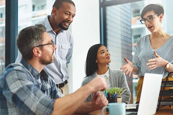 professional team in a meeting talking