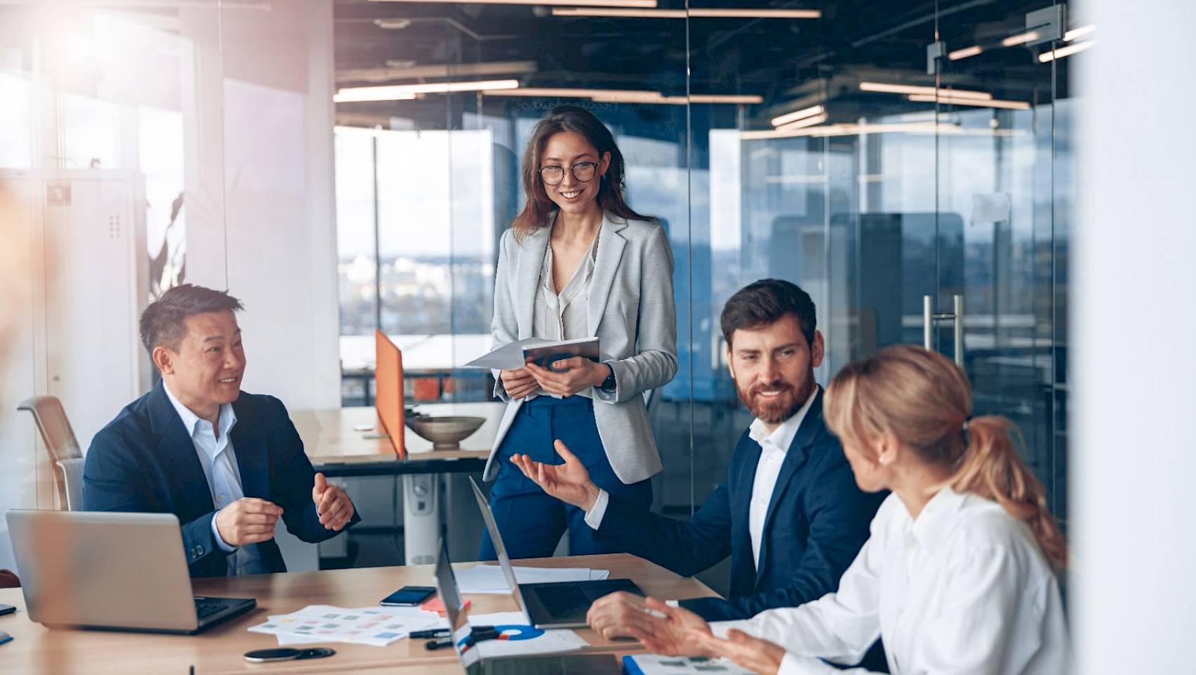 professional team in a meeting talking