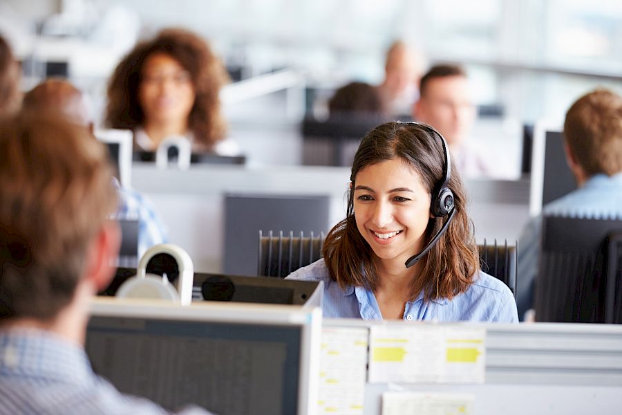 Young customer service professional wearing a headset